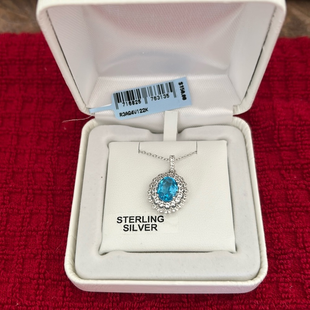 Beautiful Sterling Silver and genuine Blue Topaz necklace